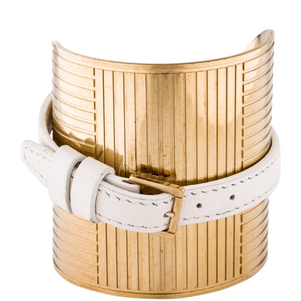 Elie Saab wide cuff featuring wrapped faux leather fabric and buckle closure.